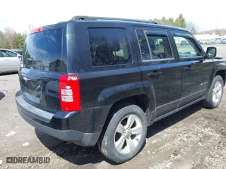 2014 Jeep Patriot Sport with VIN 1C4NJRBB1ED811019, listed as a IAAI auction lot 42039895 with 124,837 mi miles. Bid and sale history available at carsss.com. Image 4.