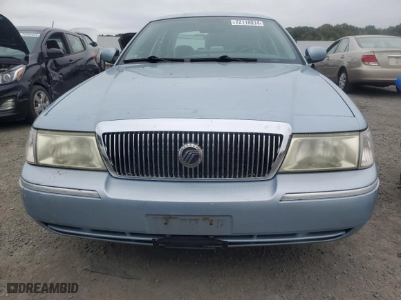 2003 Mercury Grand Marquis GS Convenience with VIN 2MEFM74W63X704603, listed as a Copart auction lot 72118014 with 128,599 mi miles and Clean Title. Bid and sale history available at carsss.com. Image 5.