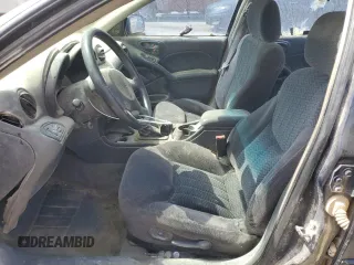 2001 Pontiac Grand Am SE1 with VIN 1G2NF52T31M547738, listed as a Copart auction lot 57442525 with 180,899 mi miles and Salvage title. Bid and sale history available at DreamBid. Image 7.