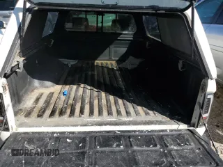 2003 Toyota Tacoma z VIN 5TENL42N53Z256698, wystawiony jako Copart lot #59738915 z przebiegiem 209 801 mil mil oraz Czysty tytuł • Clean title. Historia ofert i sprzedaży dostępna na DreamBid. Obrazek 10.