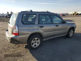 2006 Subaru Forester 2.5 X with VIN JF1SG63686H737955, listed as a Copart auction lot 77486284 with 184,976 mi miles and Salvage Title. Bid and sale history available at carsss.com. Image 3.