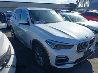 2020 BMW X5 sDrive40i with VIN 5UXCR4C09L9B35467, listed as a IAAI auction lot 41664250 with 24,409 mi miles and . Bid and sale history available at DreamBid. Image 1.