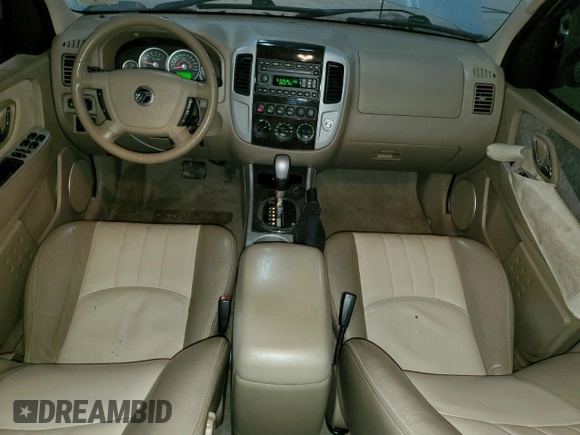 2005 Mercury Mariner Luxury z VIN 4M2CU57135DJ00228, wystawiony jako Copart lot #87603775 z przebiegiem 169 099 mil mil oraz Szkody całkowita. Historia ofert i sprzedaży dostępna na DreamBid. Obrazek 8.