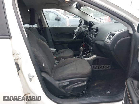 2018 Jeep Compass Sport with VIN 3C4NJCABXJT263332, listed as a IAAI auction lot 41554259 with 91,156 mi miles and . Bid and sale history available at DreamBid. Image 5.