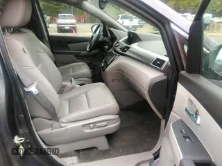 2015 Honda Odyssey EX-L z VIN 5FNRL5H69FB060423, wystawiony jako IAAI lot #42335707 z przebiegiem 175 770 mil mil oraz . Historia ofert i sprzedaży dostępna na DreamBid. Obrazek 5.