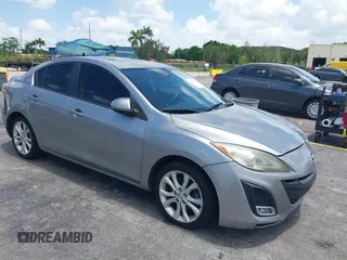 2011 Mazda 3 S Grand Touring z VIN JM1BL1W55B1474676, wystawiony jako IAAI lot #42494974 z przebiegiem 162 285 mil mil oraz . Historia ofert i sprzedaży dostępna na DreamBid. Obrazek 1.