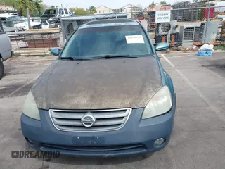 2003 Nissan Altima SE z VIN 1N4BL11D63C282757, wystawiony jako IAAI lot #41859329 z przebiegiem 218 391 mil mil oraz . Historia ofert i sprzedaży dostępna na DreamBid. Obrazek 6.