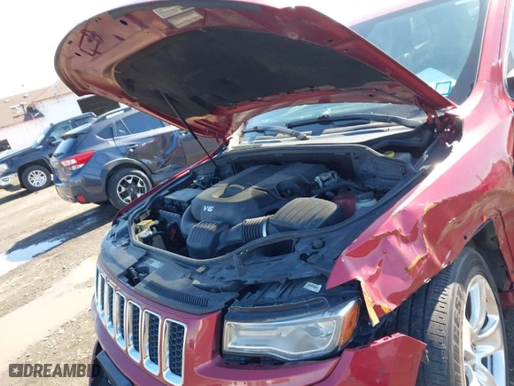 2014 Jeep Grand Cherokee Overland with VIN 1C4RJFCG2EC216406, listed as a IAAI auction lot 41944794 with 124,007 mi miles. Bid and sale history available at carsss.com. Image 10.