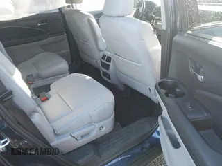2022 Honda Pilot Touring 7-Passenger with VIN 5FNYF6H60NB043212, listed as a IAAI auction lot 41448994 with 41,660 mi miles. Bid and sale history available at carsss.com. Image 8.