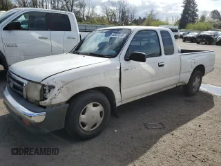 1999 Toyota Tacoma z VIN 4TAVL52N5XZ539976, wystawiony jako Copart lot #52037515 z przebiegiem 261 227 mil mil oraz Szkoda całkowita • Salvage title. Historia ofert i sprzedaży dostępna na DreamBid. Obrazek 1.