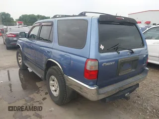 1999 Toyota 4Runner SR5 with VIN JT3GN86R1X0097244, listed as a IAAI auction lot 41948315 with 128,531 mi miles and . Bid and sale history available at DreamBid. Image 3.