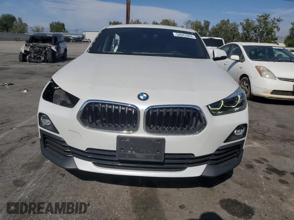 2018 BMW X2 sDrive28i with VIN WBXYJ3C34JEJ84163, listed as a Copart auction lot 54043904 with 46,509 mi miles and Salvage title. Bid and sale history available at DreamBid. Image 5.