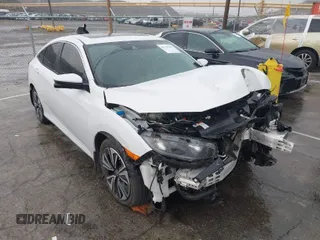 2020 Honda Civic Sedan EX-L with VIN 19XFC1F7XLE208720, listed as a IAAI auction lot 41725235 with 70,794 mi miles. Bid and sale history available at carsss.com. Image 1.