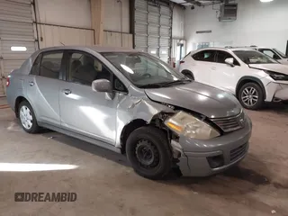 2008 Nissan Versa 1.8 S with VIN 3N1BC11E78L440086, listed as a IAAI auction lot 41362588 with 123,227 mi miles. Bid and sale history available at carsss.com. Image 1.