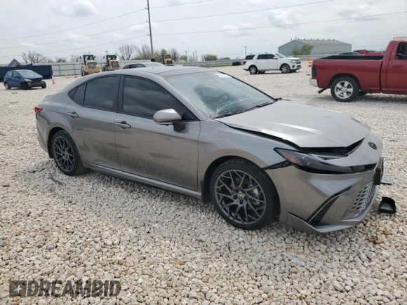 2025 Toyota Camry LE with VIN 4T1DAACKXSU563016, listed as a Copart auction lot 50403945 with 1,689 mi miles and Salvage Title. Bid and sale history available at carsss.com. Image 4.