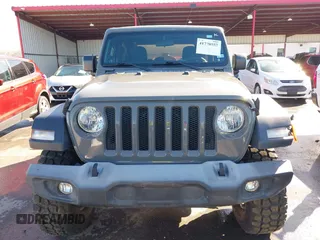 2018 Jeep Wrangler Sport S with VIN 1C4GJXAG4JW283209, listed as a IAAI auction lot 41770557 with 34,041 mi miles and . Bid and sale history available at DreamBid. Image 12.