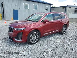 2020 Cadillac XT6 FWD Premium Luxury with VIN 1GYKPERS8LZ228263, listed as a Copart auction lot 63206945 with 79,553 mi miles and Salvage title. Bid and sale history available at DreamBid. Image 1.
