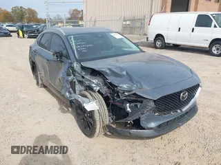 2023 Mazda CX-30 2.5 S Preferred Package with VIN 3MVDMBCM1PM537644, listed as a IAAI auction lot 40969602 with 1 mi miles. Bid and sale history available at carsss.com. Image 1.
