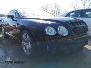2004 Bentley Continental GT GT z VIN SCBCR63W84C021434, wystawiony jako IAAI lot #41774076 z przebiegiem 66 426 mil mil oraz . Historia ofert i sprzedaży dostępna na DreamBid. Obrazek 1.