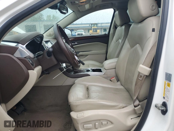 2013 Cadillac SRX Performance Collection with VIN 3GYFNHE33DS602428, listed as a Copart auction lot 55688555 with 143,504 mi miles and Salvage title. Bid and sale history available at DreamBid. Image 7.
