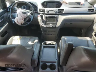 2014 Honda Odyssey Touring with VIN 5FNRL5H93EB061754, listed as a Copart auction lot 55182015 with 168,058 mi miles and Salvage title. Bid and sale history available at DreamBid. Image 8.