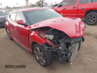 2013 Hyundai Veloster Turbo with VIN KMHTC6AE3DU096959, listed as a IAAI auction lot 41749843 with 87,662 mi miles and . Bid and sale history available at DreamBid. Image 1.