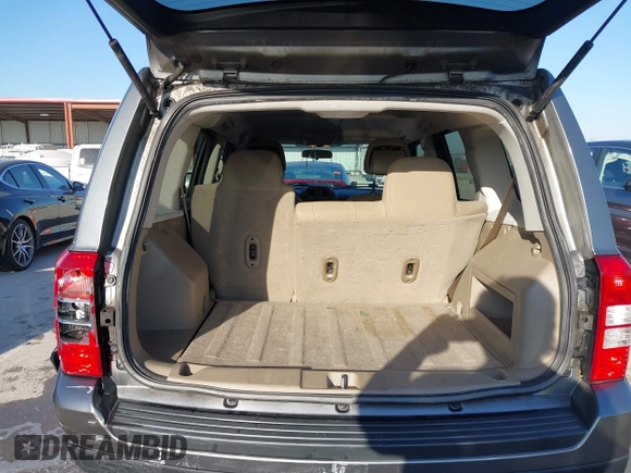 2011 Jeep Patriot Sport with VIN 1J4NT1GA1BD220156, listed as a IAAI auction lot 41760424 with 100,336 mi miles and . Bid and sale history available at carsss.com. Image 18.