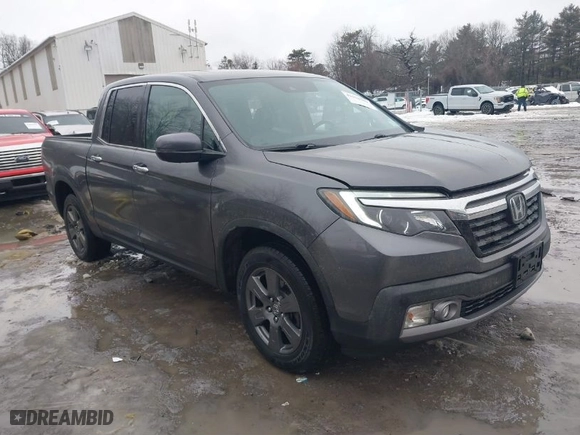 2020 Honda Ridgeline RTL-E with VIN 5FPYK3F70LB015422, listed as a IAAI auction lot 41578369 with 78,860 mi miles. Bid and sale history available at carsss.com. Image 1.