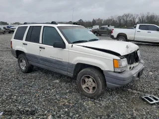 1997 Jeep Grand Cherokee TSi with VIN 1J4FX58S0VC578818, listed as a Copart auction lot 48463795 with 133,200 mi miles and Salvage Title. Bid and sale history available at carsss.com. Image 4.