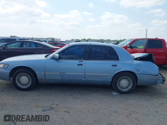 2000 Mercury Grand Marquis LS z VIN 2MEFM75W1YX673105, wystawiony jako IAAI lot #42050980 z przebiegiem 154 944 mil mil oraz . Historia ofert i sprzedaży dostępna na DreamBid. Obrazek 14.