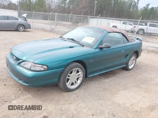 1996 Ford Mustang GT with VIN 1FALP45X7TF129303, listed as a IAAI auction lot 41698238 with 130,181 mi miles. Bid and sale history available at carsss.com. Image 2.