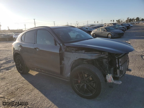 2020 Alfa Romeo Stelvio Ti with VIN ZASPAKBN2L7C74688, listed as a Copart auction lot 46311485 with 59,958 mi miles and Salvage Title. Bid and sale history available at carsss.com. Image 4.