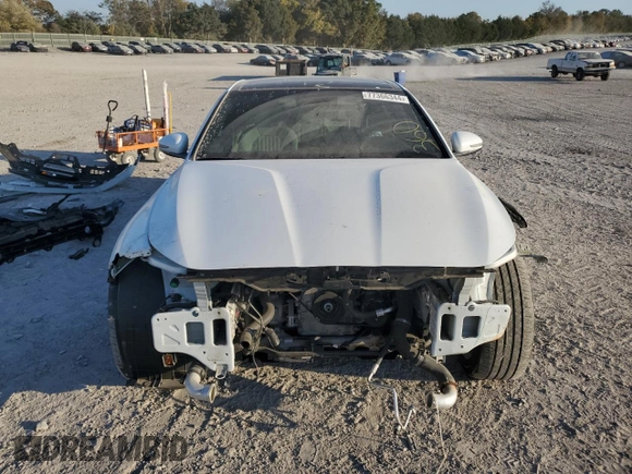 2023 Genesis G70 2.0T with VIN KMTG34TA3PU105184, listed as a Copart auction lot 77366344 with 36,582 mi miles and Salvage Title. Bid and sale history available at carsss.com. Image 5.