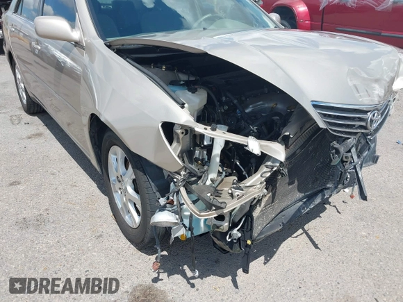 2006 Toyota Camry STD z VIN 4T1BE30KX6U658158, wystawiony jako IAAI lot #42394262 z przebiegiem 102 830 mil mil oraz . Historia ofert i sprzedaży dostępna na DreamBid. Obrazek 17.
