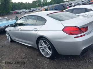 2014 BMW 6 Series 650i z VIN WBA6B2C58ED129639, wystawiony jako IAAI lot #42171786 z przebiegiem 108 677 mil mil oraz . Historia ofert i sprzedaży dostępna na DreamBid. Obrazek 14.