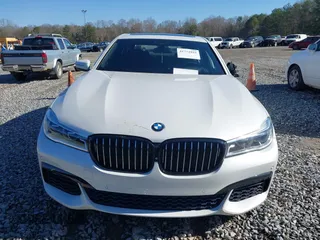 2017 BMW 7 Series 750i with VIN WBA7F0C34HGM21738, listed as a IAAI auction lot 41772933 with 62,923 mi miles and . Bid and sale history available at carsss.com. Image 12.