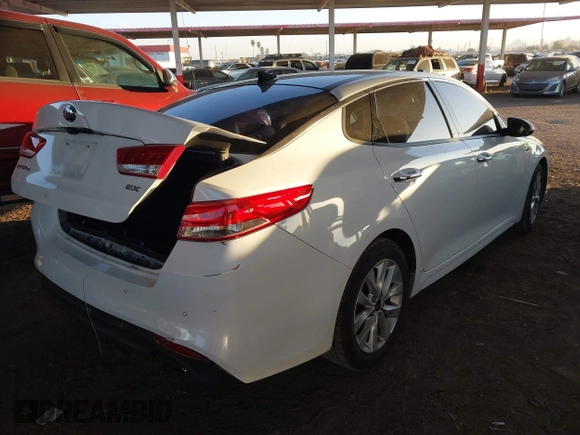 2016 Kia Optima EX with VIN 5XXGU4L30GG117411, listed as a IAAI auction lot 42034988 with 123,387 mi miles. Bid and sale history available at carsss.com. Image 4.