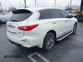 2014 Infiniti QX60 Hybrid with VIN 5N1CL0MM6EC519749, listed as a IAAI auction lot 41470769 with 153,766 mi miles and . Bid and sale history available at DreamBid. Image 4.