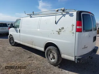 2013 Chevrolet Express Cargo Van with VIN 1GCWGGCA3D1117610, listed as a IAAI auction lot 41196391 with 201,350 mi miles. Bid and sale history available at carsss.com. Image 3.