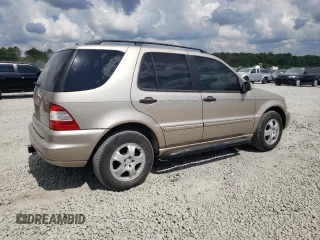 2002 Mercedes-Benz M-Class with VIN 4JGAB54E72A322046, listed as a Copart auction lot 74393084 with 128,015 mi miles and Salvage Title. Bid and sale history available at carsss.com. Image 3.