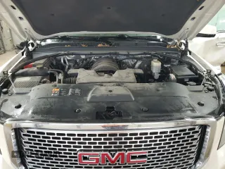 2015 GMC Yukon Denali with VIN 1GKS2CKJ1FR564002, listed as a Copart auction lot 45494045 with 108,310 mi miles and Salvage Title. Bid and sale history available at carsss.com. Image 12.