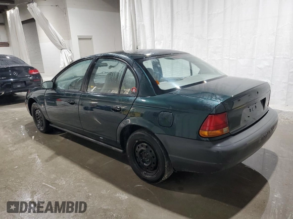 1998 Saturn SL z VIN 1G8ZH5280WZ312544, wystawiony jako Copart lot #50971665 z przebiegiem 119 855 mil mil oraz Szkoda całkowita • Salvage title. Historia ofert i sprzedaży dostępna na DreamBid. Obrazek 2.