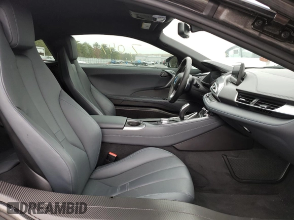 2016 BMW i8 z VIN WBY2Z2C52GV675619, wystawiony jako Copart lot #39725842 z przebiegiem 7047 mil mil oraz . Historia ofert i sprzedaży dostępna na DreamBid. Obrazek 5.