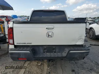2017 Honda Ridgeline RTL-T z VIN 5FPYK2F69HB007182, wystawiony jako Copart lot #52507175 z przebiegiem 74 956 mil mil oraz Szkody całkowita. Historia ofert i sprzedaży dostępna na DreamBid. Obrazek 6.