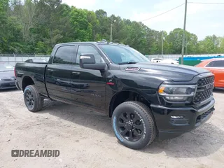 2024 Ram 2500 Big Horn with VIN 3C6UR5DL5RG205340, listed as a IAAI auction lot 39291590 with 15 mi miles and . Bid and sale history available at DreamBid. Image 1.