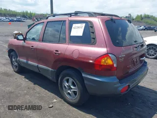 2003 Hyundai Santa Fe GLS z VIN KM8SC73D83U543841, wystawiony jako IAAI lot #42220132 z przebiegiem 215 325 mil mil oraz . Historia ofert i sprzedaży dostępna na DreamBid. Obrazek 3.