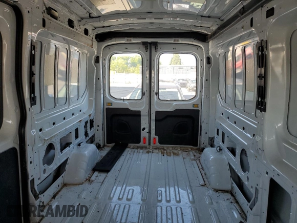 2016 Ford Transit Cargo z VIN 1FTYR2CG8GKB02965, wystawiony jako Copart lot #58747654 z przebiegiem 92 455 mil mil oraz Szkoda całkowita • Salvage title. Historia ofert i sprzedaży dostępna na DreamBid. Obrazek 10.