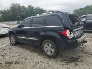 2007 Jeep Grand Cherokee Overland with VIN 1J8HR68227C651830, listed as a Copart auction lot 62403725 with 147,827 mi miles and Salvage title. Bid and sale history available at DreamBid. Image 2.