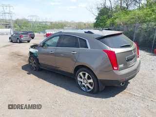 2011 Cadillac SRX Premium Collection with VIN 3GYFNFEY7BS519548, listed as a IAAI auction lot 42097305 with 124,083 mi miles and . Bid and sale history available at DreamBid. Image 3.