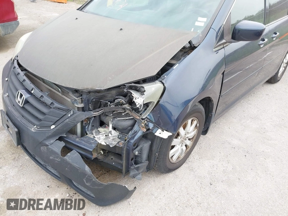 2009 Honda Odyssey EX-L with VIN 5FNRL38769B409281, listed as a IAAI auction lot 42013137 with 213,934 mi miles and . Bid and sale history available at DreamBid. Image 12.